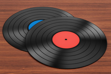 Vinyl records on the wooden table. 3D rendering