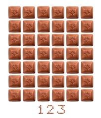 Designer mesh made from pieces of natural chocolate isolated on white background for making letters and numbers