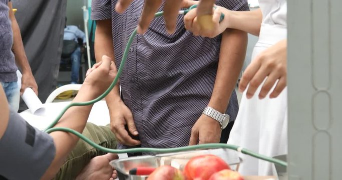 Doctor checking blood pressure on patient