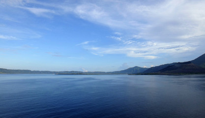 Fototapeta na wymiar Scene of Simpson Harbour and Rabaul from a cruise ship.
