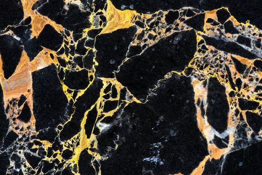 golden black marble texture pattern , luxury design by natural