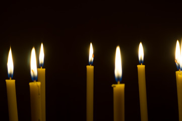 several glowing candles