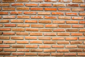 Modern style of red bricks wall close up for background.