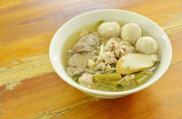 pork ball and liver with bean sprout soup on bowl