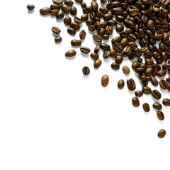 Arrangement of scattered coffee beans isolated on white  - corner design element