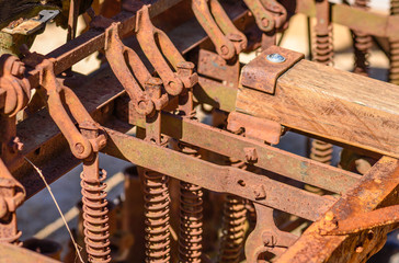 Obraz na płótnie Canvas Rusty Farm Equipment