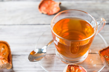 Bael tea juice on wooden table , healthy drink