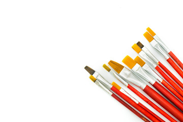 Assorted artists paint brushes isolated on a white background