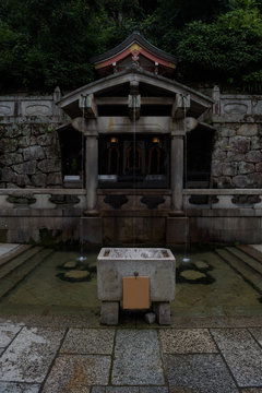 Streams with holy water from the Otowa Waterfall at the Kiyomizu-dera temple, Kyoto, Japan