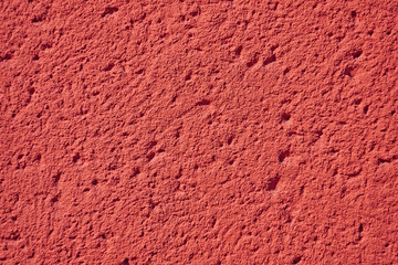 red colorful rough plaster detail, copy space for typing