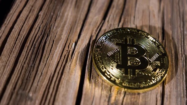 Bitcoin cryptocurrency concept, old wood planks