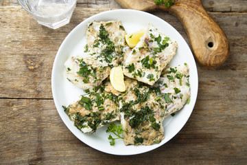 Baked fish with lemond and herbs