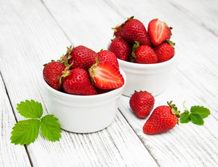 ripe strawberries on wooden table