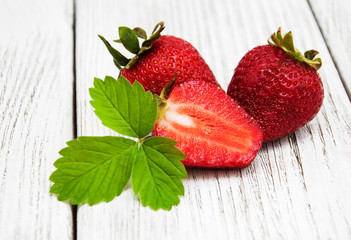 ripe strawberries on wooden table