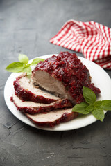 Baked pork with fruit sauce