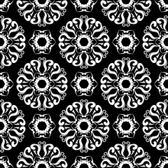 White floral seamless pattern on black background