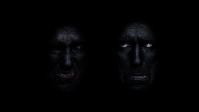 Scary black painted faces.
