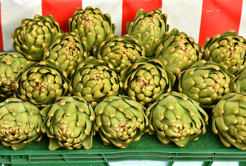 Fototapeta na wymiar Vegetable background with fresh artichokes.Artichokes in the market.