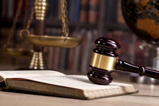 Wooden Judges gavel ,golden scales justice. Law concept