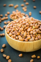Peanuts in wooden bowl