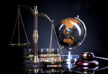 Wooden Judges gavel ,golden scales of justice. Legal office.