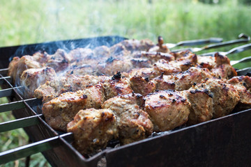 Skewers grilling on a barbecue