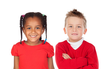 Two funny children in red looking at camera