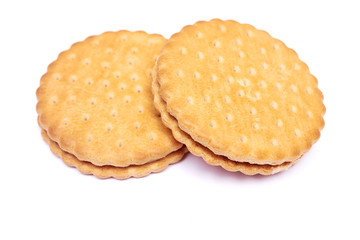 Sandwich biscuits with vanilla filling on a white background
