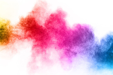 Naklejka na ściany i meble abstract powder splatted background. Colorful powder explosion on white background. Colored cloud. Colorful dust explode. Paint Holi.