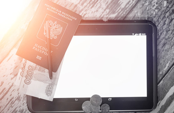 The graph of income growth. Electronic tablet with a graph of gr