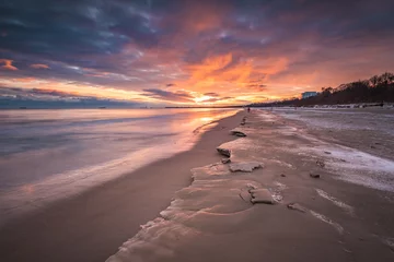 Wallpaper murals The Baltic, Sopot, Poland Winter landscape with colorful sunrise at the beach in Gdansk in Poland. Baltic Sea.