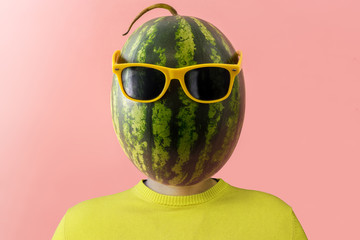 A man with a watermelon instead of head. Minimal concept.