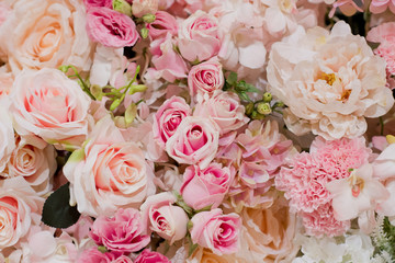 Obraz na płótnie Canvas flower background. backdrop wedding decoration. Rose pattern. Wall flower
