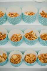 wedding catering food. mini canapes food.  tasty dessert. Beautiful decorate catering banquet table.  snacks and appetizers. wedding celebration