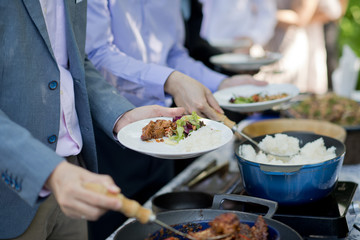 scooping the food. Buffet food at restaurant. Catering food