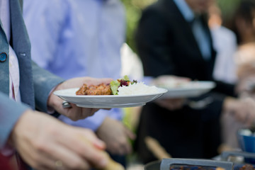scooping the food. Buffet food at restaurant. Catering food