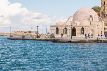 Obraz premium Chania, Crete - 04 November, 2017: Old Venetian harbor in Chania. Crete, Greece.