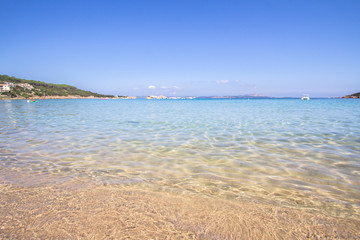 The beach at Baja Sardinia in Sardinia, Italy