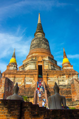 Fototapeta premium The Pagoda and Buddha Status at Wat Yai Chaimongkol, Ayutthaya,