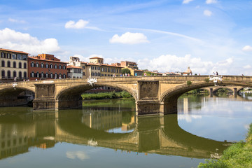 Fototapeta na wymiar Santa Trinita bridge over river Arno. Florence. Italy