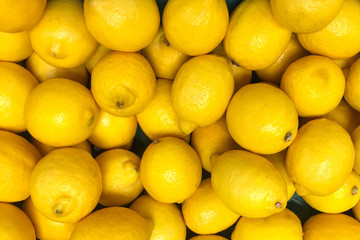 A pile of lemons as a background