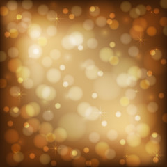 Shining brown background with bokeh. Holiday lights. Golden bokeh