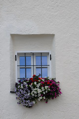 Fototapeta na wymiar Typical decorated windows in South Tyrol, Italy
