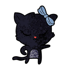 cute cartoon cat with bow