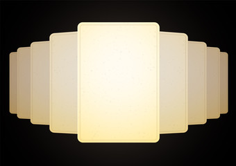 A stack of a deck of several cards spread out on the table with a panorama. The blank, the old paper is yellow