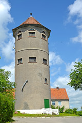 Fototapeta na wymiar Old water tower on Karl Marx Street. Gvardeysk, Kaliningrad region