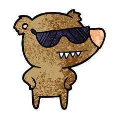 sunglasses bear cartoon with hands on hips
