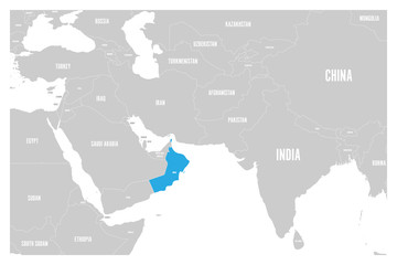 Oman blue marked in political map of South Asia and Middle East. Simple flat vector map..
