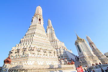 Big pagoda in Wat Arun Ratchawararam Ratchawaramahawihan / Wat Arun Landmark of Thailand in Sunset time