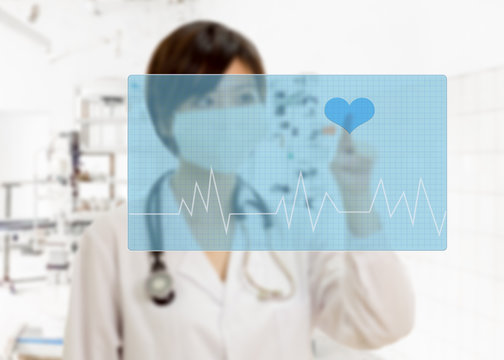 Defocused doctor pressing heart button on virtual interface - Powered by Adobe
